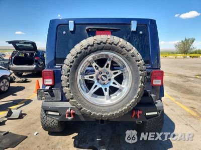 Zdjęcie 6 z 13 samochodu: 2013 JEEP WRANGLER UNLIMITED SAHARA VIN:1C4HJWEG6DL579721 - miniatura