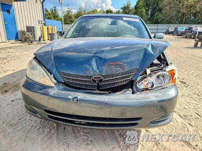 Piąte zdjęcie samochodu w środku: 2004 TOYOTA CAMRY LE VIN:4T1BE32KX4U341281 - miniatura