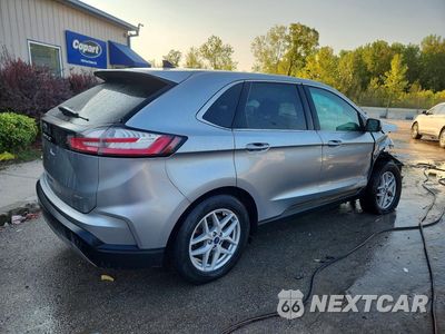 Trzecie zdjęcie samochodu z tyłu: 2022 FORD EDGE SEL VIN:2FMPK4J95NBA92222 - miniatura