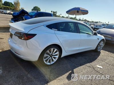 Trzecie zdjęcie samochodu z tyłu: 2019 TESLA MODEL 3 VIN:5YJ3E1EB2KF512572 - miniatura