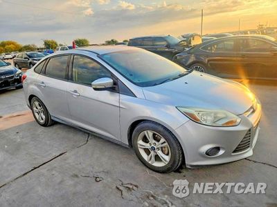 Czwarte zdjęcie samochodu z boku: 2014 FORD FOCUS SE VIN:1FADP3F2XEL440214 - miniatura