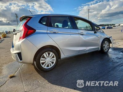 Trzecie zdjęcie samochodu z tyłu: 2015 HONDA FIT LX VIN:3HGGK5H54FM738056 - miniatura