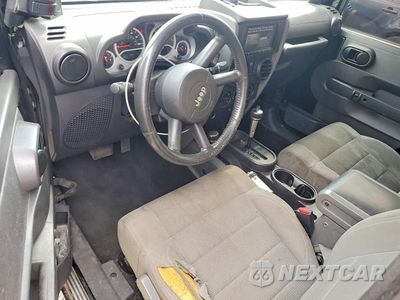 Zdjęcie 8 z 12 samochodu: 2007 JEEP WRANGLER SAHARA VIN:1J8FA54107L201311 - miniatura