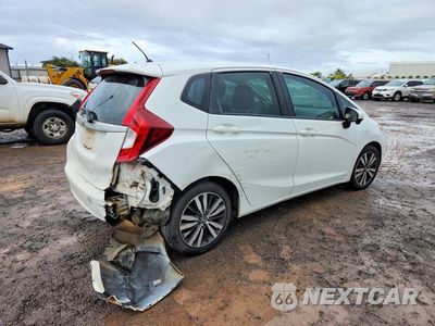 Trzecie zdjęcie samochodu z tyłu: 2016 HONDA FIT EX VIN:JHMGK5H70GX037346 - miniatura