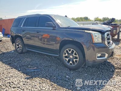Czwarte zdjęcie samochodu z boku: 2016 GMC YUKON SLT VIN:1GKS2BKC3GR337763 - miniatura