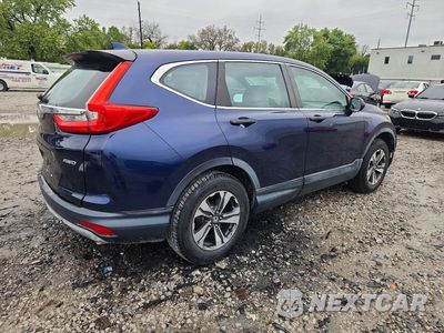 Trzecie zdjęcie samochodu z tyłu: 2017 HONDA CR-V LX VIN:2HKRW6H3XHH213902 - miniatura