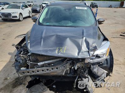 Piąte zdjęcie samochodu w środku: 2017 FORD ESCAPE TITANIUM VIN:1FMCU0JD9HUE06703 - miniatura