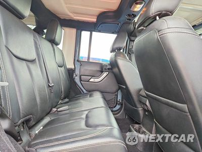 Zdjęcie 10 z 12 samochodu: 2015 JEEP WRANGLER UNLIMITED SAHARA VIN:1C4BJWEGXFL561781 - miniatura