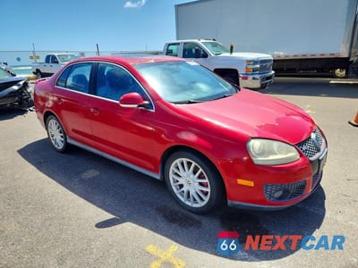Czwarte zdjęcie samochodu z boku: 2006 VOLKSWAGEN JETTA GLI OPTION PACKAGE 2 VIN:3VWXJ71K16M638653 - miniatura