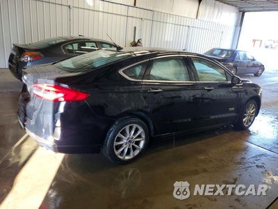 Trzecie zdjęcie samochodu z tyłu: 2017 FORD FUSION SE PHEV VIN:3FA6P0PU9HR363073 - miniatura