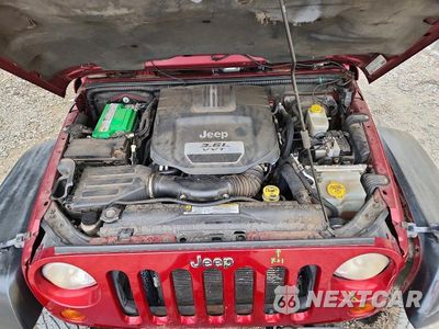 Zdjęcie 12 z 13 samochodu: 2012 JEEP WRANGLER UNLIMITED SAHARA VIN:1C4BJWEG7CL123554 - miniatura