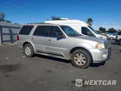 Czwarte zdjęcie samochodu z boku: 2003 LINCOLN NAVIGATOR VIN:5LMFU27R23LJ38679 - miniatura