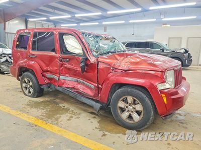 Czwarte zdjęcie samochodu z boku: 2010 JEEP LIBERTY SPORT VIN:1J4PP2GKXAW170095 - miniatura