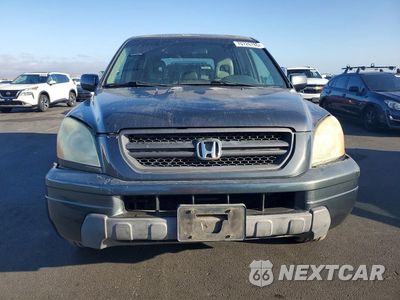 Piąte zdjęcie samochodu w środku: 2004 HONDA PILOT EXL VIN:2HKYF18634H555789 - miniatura