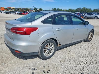 Trzecie zdjęcie samochodu z tyłu: 2017 FORD FOCUS SE VIN:1FADP3F29HL219031 - miniatura