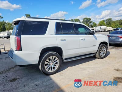 Trzecie zdjęcie samochodu z tyłu: 2017 GMC YUKON SLE VIN:1GKS2AKC6HR234638 - miniatura