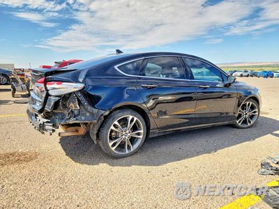 Trzecie zdjęcie samochodu z tyłu: 2019 FORD FUSION TITANIUM VIN:3FA6P0D93KR124044 - miniatura