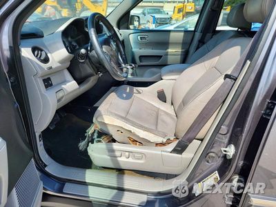 Zdjęcie 7 z 13 samochodu: 2014 HONDA PILOT TOURING VIN:5FNYF3H90EB021901 - miniatura