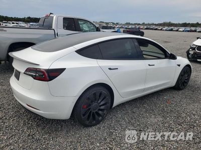 Trzecie zdjęcie samochodu z tyłu: 2022 TESLA MODEL 3 VIN:5YJ3E1EC8NF340237 - miniatura