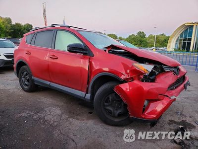 Czwarte zdjęcie samochodu z boku: 2016 TOYOTA RAV4 LE VIN:JTMZFREV4GJ063668 - miniatura