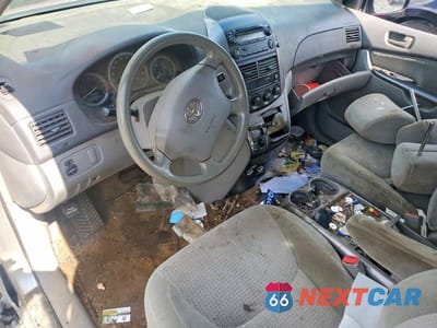 Zdjęcie 8 z 13 samochodu: 2010 TOYOTA SIENNA CE 7-PASSENGER VIN:5TDKK4CC4AS311302 - miniatura
