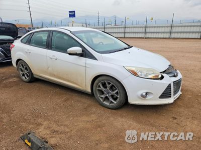 Czwarte zdjęcie samochodu z boku: 2014 FORD FOCUS SE VIN:1FADP3F23EL111273 - miniatura