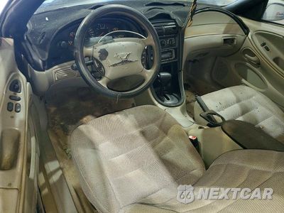 Zdjęcie 8 z 12 samochodu: 1997 FORD MUSTANG VIN:1FALP4046VF144763 - miniatura