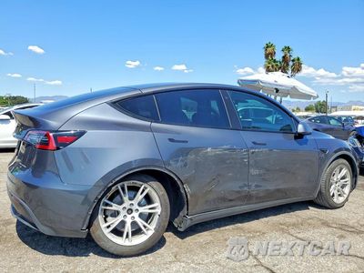 Trzecie zdjęcie samochodu z tyłu: 2020 TESLA MODEL Y VIN:5YJYGDEE3LF010604 - miniatura