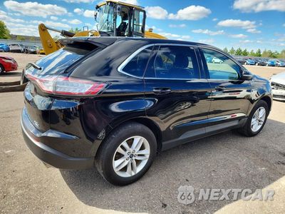 Trzecie zdjęcie samochodu z tyłu: 2018 FORD EDGE SEL VIN:2FMPK4J90JBC25902 - miniatura