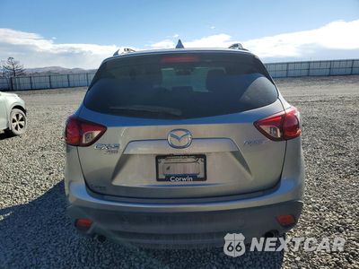 Zdjęcie 6 z 13 samochodu: 2014 MAZDA CX-5 GT VIN:JM3KE4DY1E0345506 - miniatura