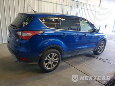 Trzecie zdjęcie samochodu z tyłu: 2017 FORD ESCAPE SE VIN:1FMCU9GDXHUE04227 - miniatura