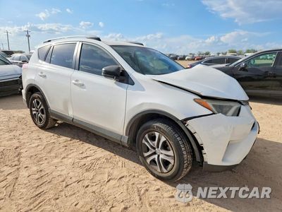 Czwarte zdjęcie samochodu z boku: 2018 TOYOTA RAV4 LE VIN:JTMZFREV5JJ210278 - miniatura