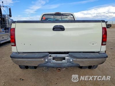 Zdjęcie 6 z 12 samochodu: 1999 FORD F350 SUPER DUTY VIN:1FTWX33F9XEA62386 - miniatura