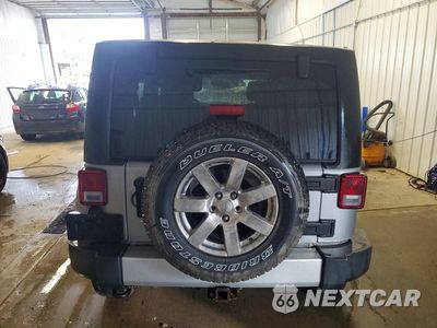 Zdjęcie 6 z 14 samochodu: 2013 JEEP WRANGLER UNLIMITED SAHARA VIN:1C4BJWEGXDL693839 - miniatura