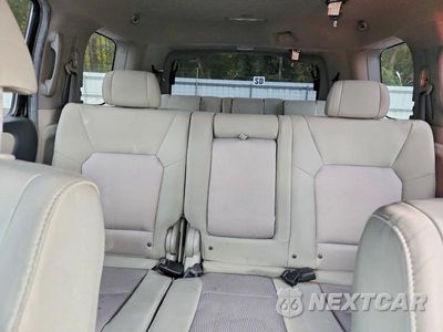 Zdjęcie 10 z 13 samochodu: 2011 HONDA PILOT EX VIN:5FNYF4H40BB091324 - miniatura