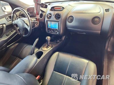 Zdjęcie 8 z 12 samochodu: 2003 MITSUBISHI ECLIPSE SPYDER GS VIN:4A3AE45G83E117588 - miniatura