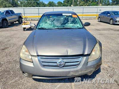 Piąte zdjęcie samochodu w środku: 2004 NISSAN ALTIMA 3.5 SE VIN:1N4BL11DX4C158508 - miniatura