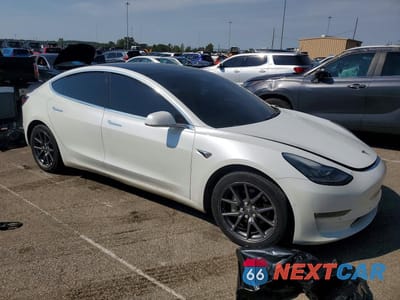 Czwarte zdjęcie samochodu z boku: 2020 TESLA MODEL 3 VIN:5YJ3E1EB8LF637755 - miniatura