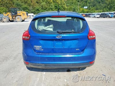 Zdjęcie 6 z 12 samochodu: 2018 FORD FOCUS SEL VIN:1FADP3M28JL310901 - miniatura