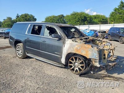 Czwarte zdjęcie samochodu z boku: 2015 GMC YUKON XL DENALI VIN:1GKS1JKJ6FR718713 - miniatura