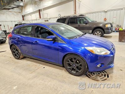 Czwarte zdjęcie samochodu z boku: 2014 FORD FOCUS SE VIN:1FADP3K24EL136205 - miniatura
