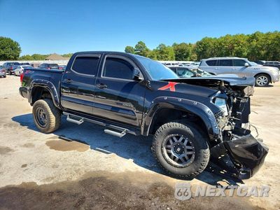 Czwarte zdjęcie samochodu z boku: 2017 TOYOTA TACOMA SR5 V6 VIN:3TMAZ5CN1HM026579 - miniatura