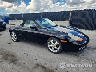 Czwarte zdjęcie samochodu z boku: 1999 PORSCHE BOXSTER VIN:WP0CA2983XU624697 - miniatura