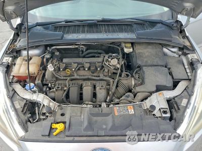 Zdjęcie 11 z 12 samochodu: 2017 FORD FOCUS TITANIUM VIN:1FADP3J21HL280011 - miniatura