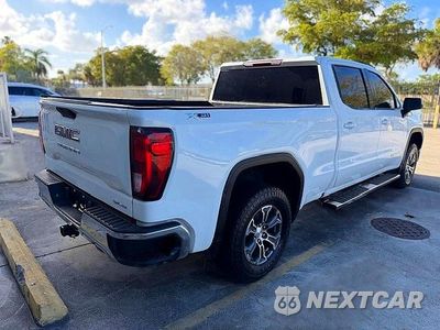 Trzecie zdjęcie samochodu z tyłu: 2021 GMC SIERRA K1500 SLE VIN:1GTU9BET4MZ191297 - miniatura
