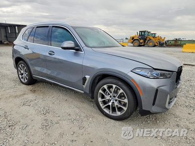 Czwarte zdjęcie samochodu z boku: 2026 BMW X5 XDRIVE40I VIN:5UX23EU04T9422035 - miniatura
