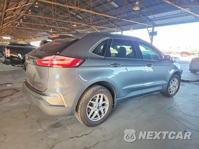 Trzecie zdjęcie samochodu z tyłu: 2021 FORD EDGE SE VIN:2FMPK4G99MBA41103 - miniatura