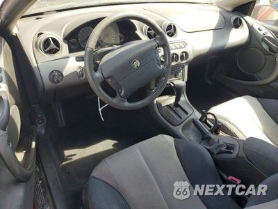 Zdjęcie 8 z 12 samochodu: 1999 MERCURY COUGAR V6 VIN:1ZWFT61L1X5641483 - miniatura