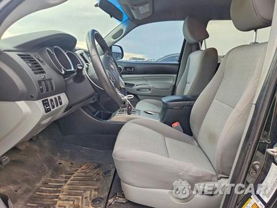 Zdjęcie 7 z 12 samochodu: 2014 TOYOTA TACOMA V6 VIN:3TMLU4EN4EM154387 - miniatura