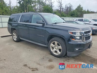 Czwarte zdjęcie samochodu z boku: 2015 CHEVROLET SUBURBAN K1500 LT VIN:1GNSKJKCXFR685099 - miniatura